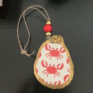 Cute oyster shell crab ornament in gold, coral and white